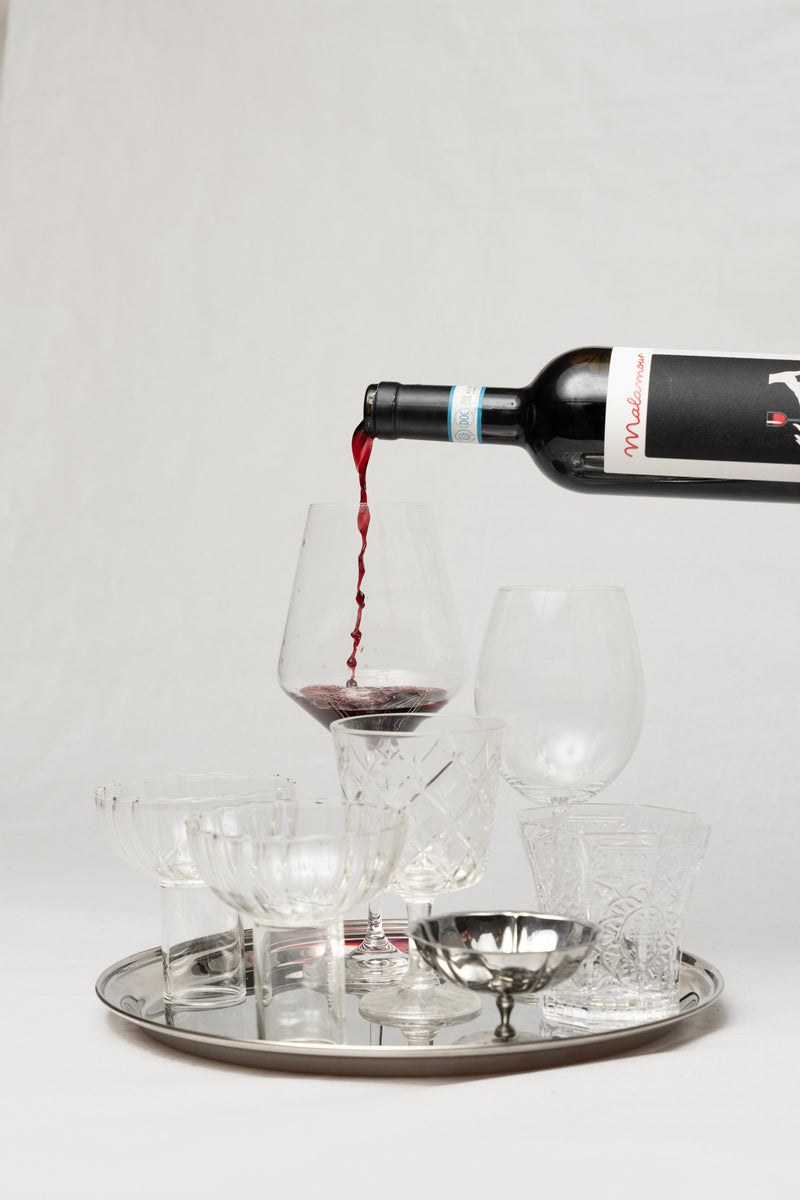 Malamour Red wine being poured into a glass — Italian Montepulciano d'Abruzzo